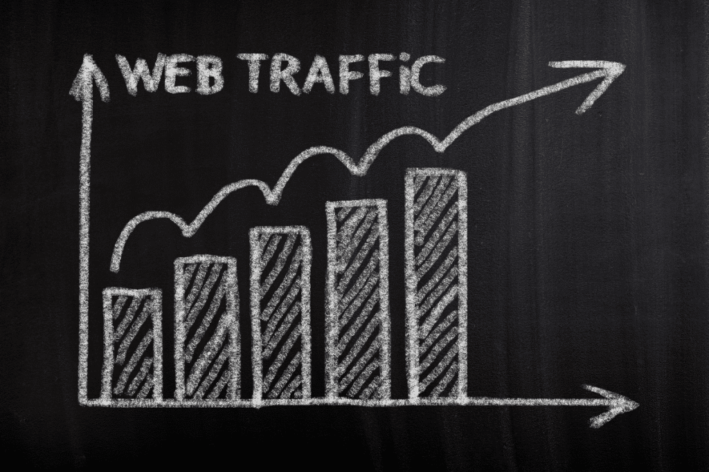 A chalkboard with the word web traffic drawn on it.