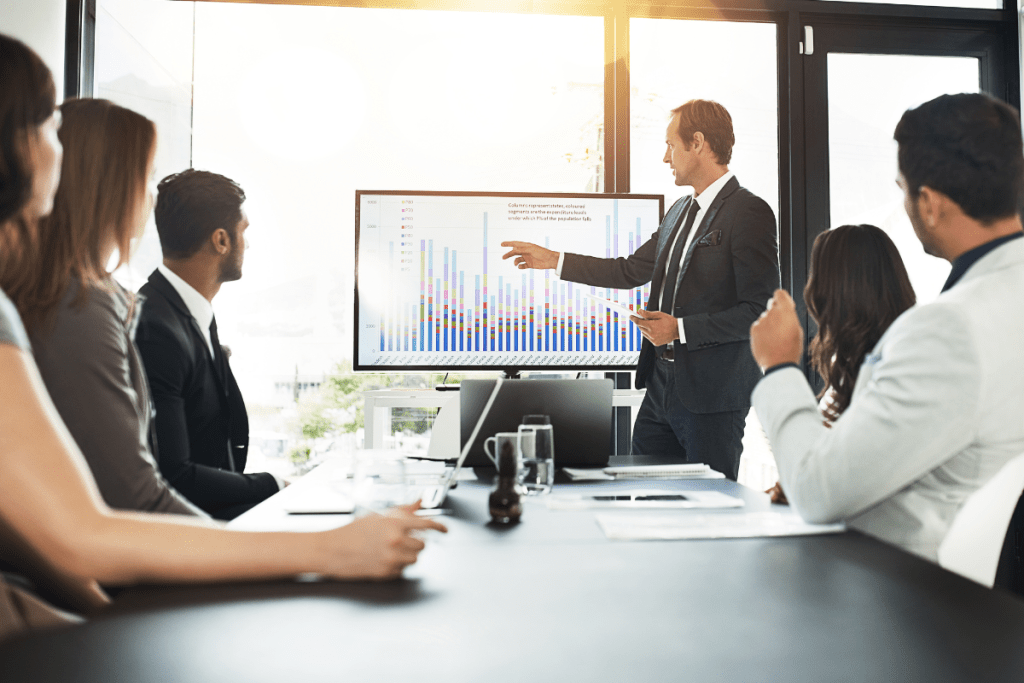 A group of business people at a conference table.